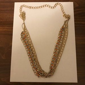 Long multi chain necklace in muted gold & orange